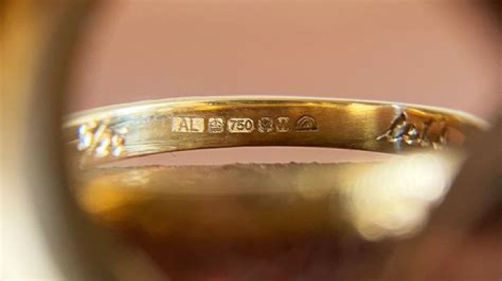 How do you clean a 18k gold ring?