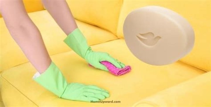 How do you clean a leather couch with Dove soap?