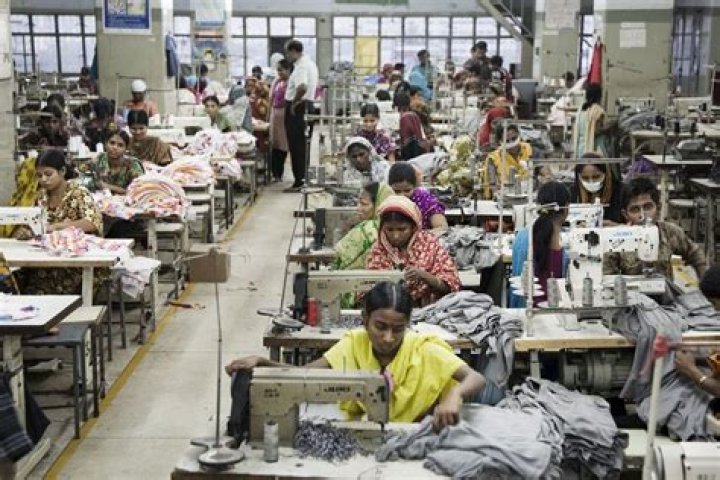How many hours a day do sweatshop workers work?