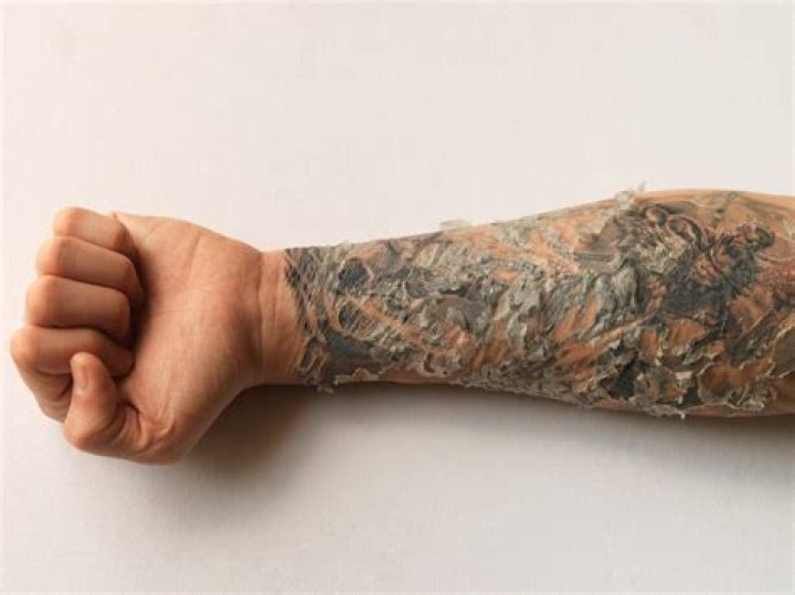 How often should you wash your tattoo when it's peeling?