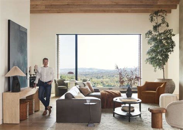 What company owns Crate and Barrel?