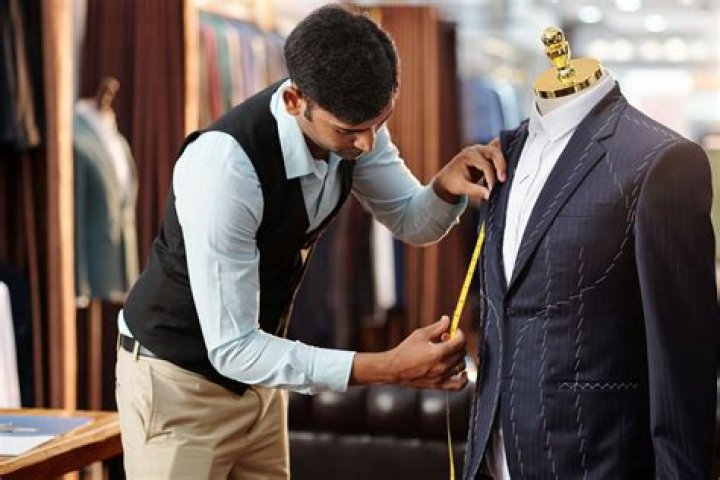 What does a merchant tailor do?