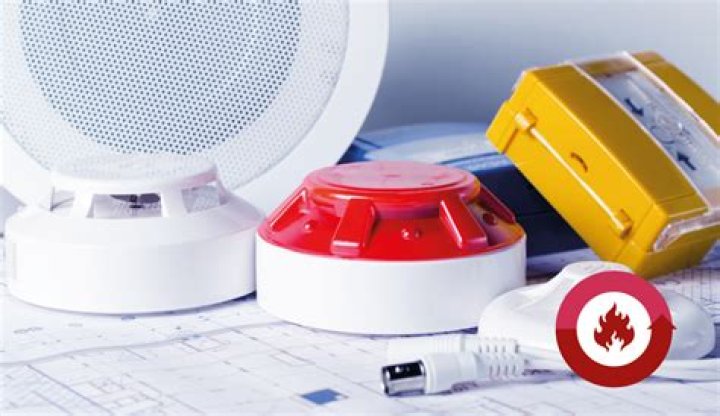 What is the difference between wired and wireless alarm systems?