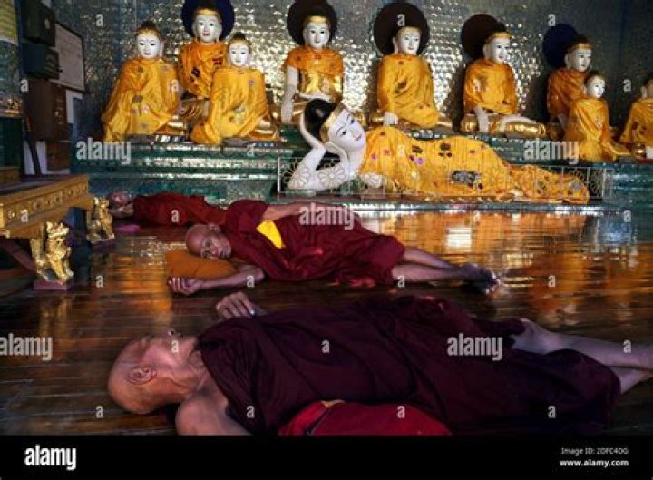 Why do Buddhist monks sleep upright?