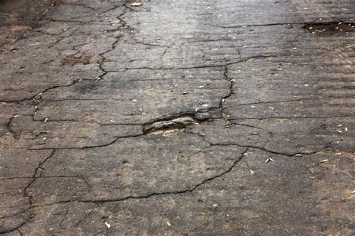 Why do concrete driveways crack?